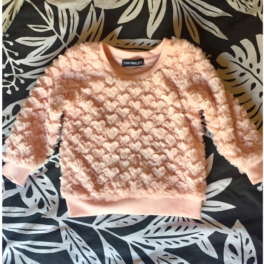 Pink heart sweater.